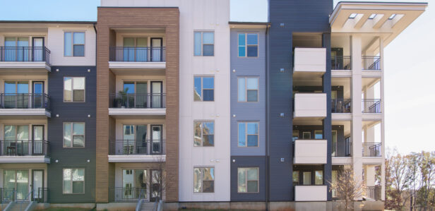 An exterior image of a building within the Wellen apartment community located in the University area of Charlotte